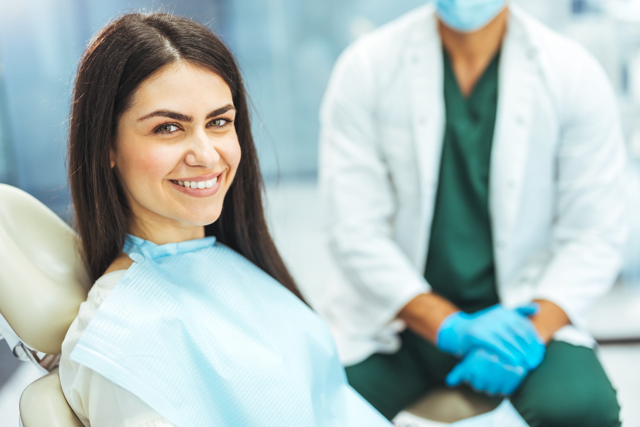 Woman smiling to the camera during dental checkup